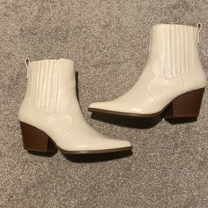 White Ankle pointed booties.